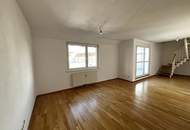 Helle 3-Zimmer Neubau Maisonette-Wohnung mit 2 Terassen, Wohnküche, Gartennutzung, Kellerabteil und Garagenplatz optional