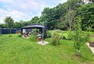 Sehr gepflegte Eigentumswohnung mit sonnigem großen 215m² Garten zur Eigennutzung