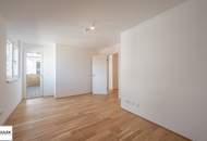 Wohnen im Bel Atrium: Zwei Zimmer Neubau Wohnung mit Balkon, inkl. Stellplatz und vielen Extras