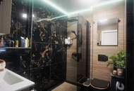 Wohnen in Top-Lage: Großzügige Großraumgarçonnière mit Balkon und Designer-Ausstattung