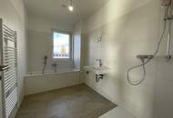 105 m² Dachterrasse für Ihr Leben im Freien – barrierefreie Komfortwohnung mit grünem Energiekonzept