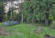 Sonniges Baugrundstück mit Bestandshaus in Grün- und Ruhelage