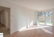 VIDEOTOUR! Eckwohnung mit schönem Eigengarten und überdachter Terrasse (3 Zimmer, inkl. 2 KFZ-Stellplätze)