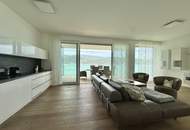 Luxusapartment mit unverbaubarem Panorama-Seeblick und privatem Seezugang am Wörthersee