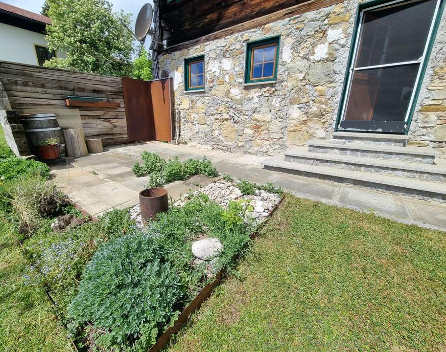 Einzigartige 3-Zimmer-Maisonette mit Garten &amp; Seeblick am Tannberg