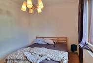 GERÄUMIGES EIN / ZWEIFAMILIENHAUS IN SONNIGER LAGE