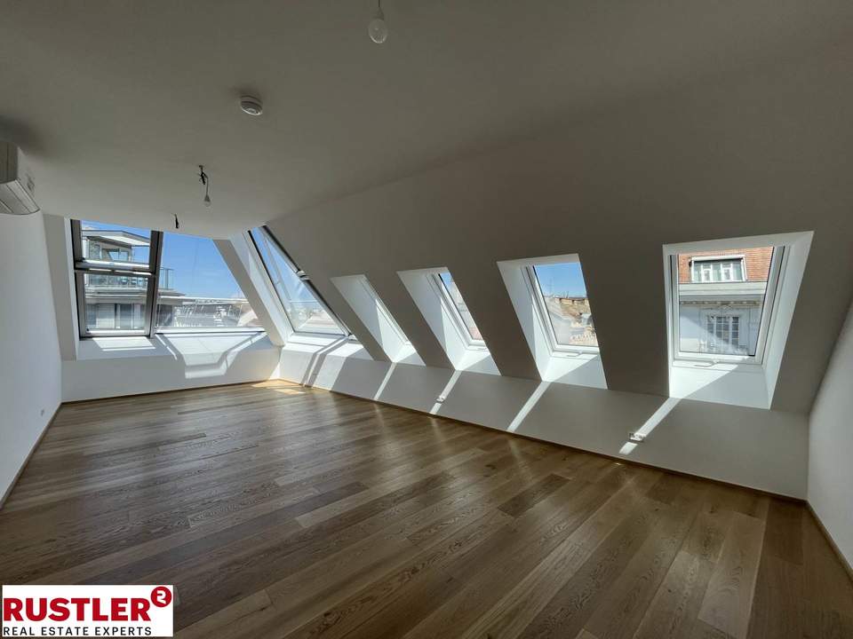 Erstbezugs-Dachgeschosswohnung in zentraler Lage