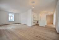 Moderne 3-Zimmer-Wohnung mit charmantem Wintergarten in traumhafter Liegenschaft!