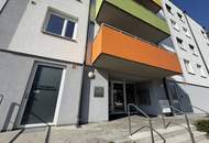 Moderne & zentrale 2-Zimmer-Eigentumswohnung mit Garten und Tiefgaragenplatz