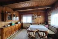 Idyllisches Holzblockhaus in Naturrandlage