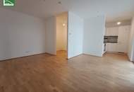 Gartenwohnung mitten in der Stadt! Karmeliterhof - Neubauwohntraum beim Rathausplatz