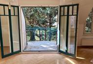 Elegante Dachgeschosswohnung mit Gartenblick, Terrassen und Garage