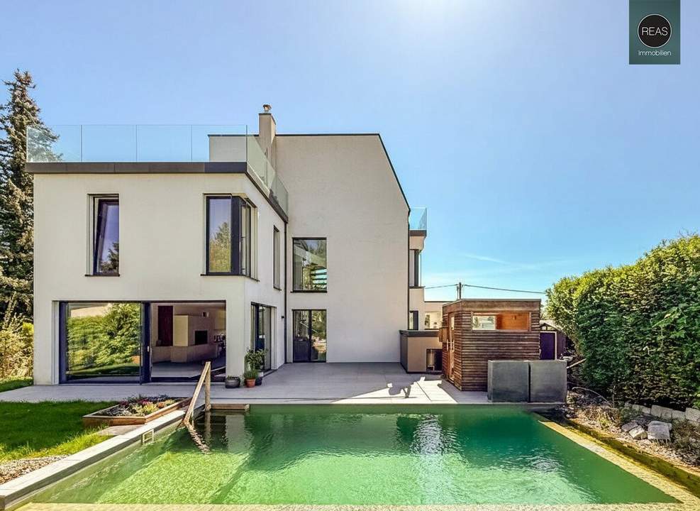 Hochwertig ausgestattete Luxusvilla mit Naturpool am Wolfersberg!