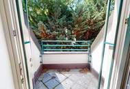 Elegante Dachgeschosswohnung mit Gartenblick, Terrassen und Garage