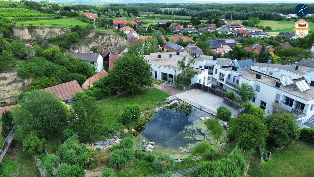 Großzügiges Penthouse mit Garten und Schwimmteich
