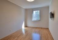 GEPFLEGTE NEUBAUWOHNUNG MIT BALKON IM ZENTRUM