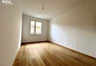 ruhiges Wohnjuwel: 4 Zimmer-Gartenwohnung im Neubau