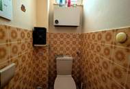 Sanierungsbedürftige 3-Zimmer-Eigentumswohnung mit Balkon, Loggia und Garage