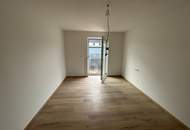 MODERNER ERSTBEZUG MIT GARTENANTEIL UND EIGENER GARAGE