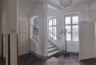 „Wohnung in einer Gründerzeitvilla am Hauptplatz: Ihre Wohnung mit Zukunftspotenzial“