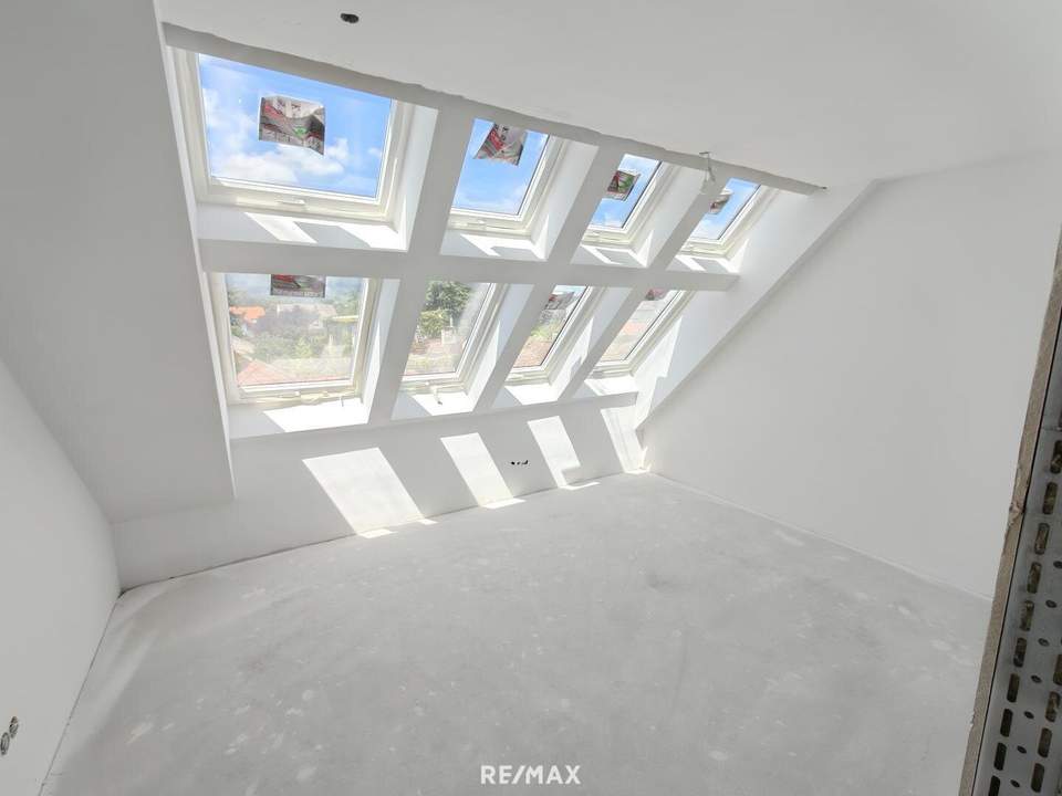 Stilvolle 3-Zimmer-Dachgeschosswohnung mit großer Dachterrasse