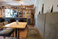 Langfristig vermietetes Café mit Garage!