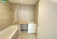 Neuwertige 2-Zimmer-Wohnung mit großer Innenhof-Fensterfront, Balkon und moderner Komplettküche! Nähe Millennium City, Handelskai und Donau. - WOHNTRAUM