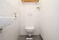 NEUBAU | Hochwertige Gartenwohnung mit traumhafter Küche, Terrasse und Garage in ruhiger Grünlage!