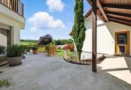 High-end living in a peaceful green location! A feel-good retreat in a class of its own: tradition meets state-of-the-art comfort!