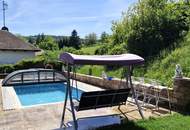Modernes Einfamilienhaus mit Pool, Garage und großzügigem Garten