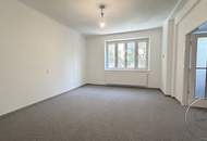 Geschütztes Refugium mit Blick ins Hof-Grün: Großzügige 3,5-Zimmer-Wohnung mit Balkon & Gestaltungsfreiraum