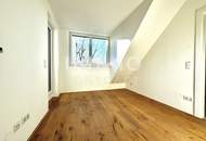 Exklusive 2-Zimmer-DG-Wohnung mit Weitblick und außergewöhnlichem Lichteinfall