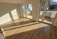 Geförderte Neubauwohnung mit Terrasse im 1. Stock