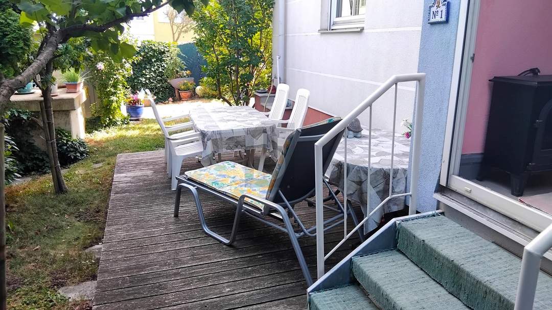 GARTENGENUSS MIT ZWEI TERRASSEN - LOGGIA - TIEFGARAGENPLATZ