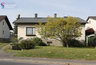 Solides Einfamilienhaus mit 3 Zimmer, Terrasse, großer Garten und 2 Garagen und Nebengebäude