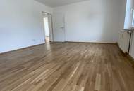 Einladendes Wohnambiente und praktische Raumaufteilung: gemütliche 2-Zimmer-Wohnung mit Grünblick bietet die perfekte Kombination aus naturnahem Wohnen und ausgezeichneter Infrastruktur in Stadtnähe!