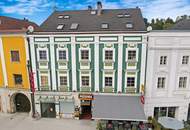 Anlageimmobilie 4,3% Rendite - Zinshaus-Anteil eines Wohn- und Geschäftshauses direkt am Marktplatz!