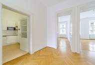 4-Zimmer-Altbauwohnung mit Balkon und Fischgrätparkett in ruhiger Innenhoflage