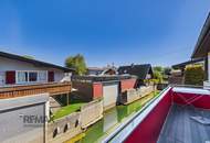 Ein ganz besonderer Platz am Bodensee – charmantes Bootshaus mit eigener Bootsgarage direkt am Wasser