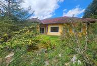 BAUMEISTERBUNGALOW IN FABELHAFTER WALDRANDLAGE