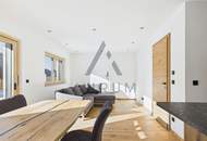 Miete Neubau: Exklusive, sonnige Gartenwohnung mit freiem Blick