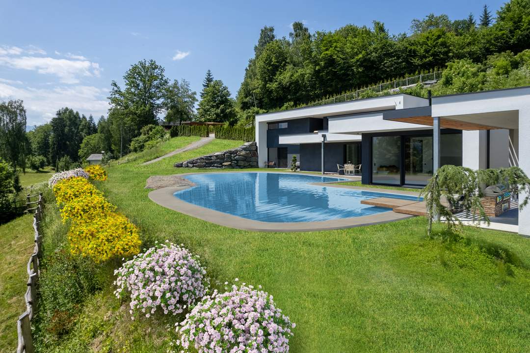 Luxus-Wohnhaus mit Schwimmteich in traumhafter Ruhe-/ & Aussichtslage im Rosental