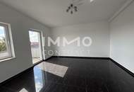 Miethaus mit 9 Wohnungen, Gemeinschaftsgarten und Carports