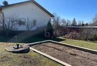 ATTRAKTIVES WOHNEN MIT GROßEM GARTEN IN IDYLLISCHER LAGE
