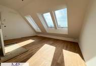 Helle und freundliche 2-Zimmer DG Wohnung mit Balkon und großer Dachterrasse mit 360° Stadtblick!