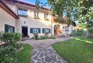 Außergewöhnliche Haushälfte vor den Toren Wiens mit enormem Potential