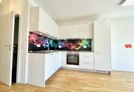 Sonniges 3 Zimmer Neubau-Eigentum Bj 2022 mit Terrasse, Tiefgaragenplatz & Grünblick in schöner Ruhelage