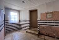 12 Zimmer Haus mit Geschäftslokal auf 948 m2 Grundstück