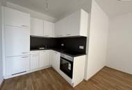Traumhafte Erstbezugswohnung mit großem Balkon, hochwertiger Tischlerküche und Tiefgaragenplatz – Koffer auspacken und das Leben genießen!