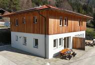 Etabliertes Ferienhaus-Ensemble am Millstätter See. Zwei moderne Häuser mit bestehender Vermietung. Investment.